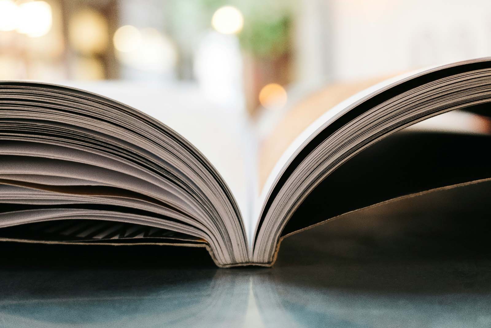 An open book viewed from the side